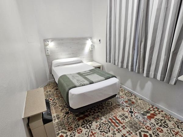 Casa de Huéspedes Almansa : photo 9 de la chambre chambre simple avec salle de bains commune