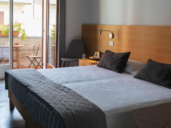 Bed and Bike Verona : photo 1 de la chambre chambre double ou lits jumeaux deluxe avec balcon