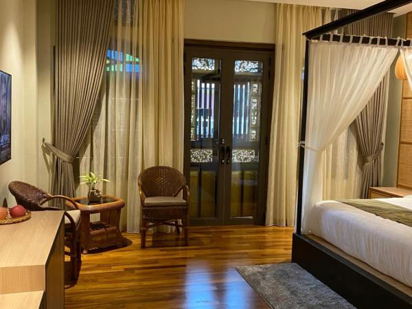 ke-lan-tan House : photo 2 de la chambre suite lit king-size avec balcon