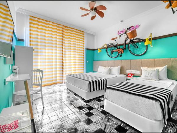 Anjeliq Downtown Boutique Hotel : photo 4 de la chambre chambre familiale - vue latérale sur mer