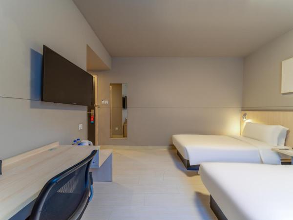 Maixinge Hotel - shuttle bus to Shanghai Pudong International Airport : photo 1 de la chambre chambre affaires lits jumeaux