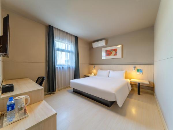 Maixinge Hotel - shuttle bus to Shanghai Pudong International Airport : photo 2 de la chambre chambre supérieure lit queen-size