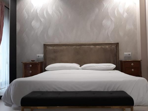 Los Patios de Santander : photo 1 de la chambre chambre lit queen-size deluxe avec terrasse privée et salle de bains