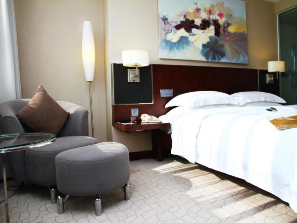 The Pavilion Century Tower (Huaqiang NorthBusiness Zone) : photo 5 de la chambre suite affaires