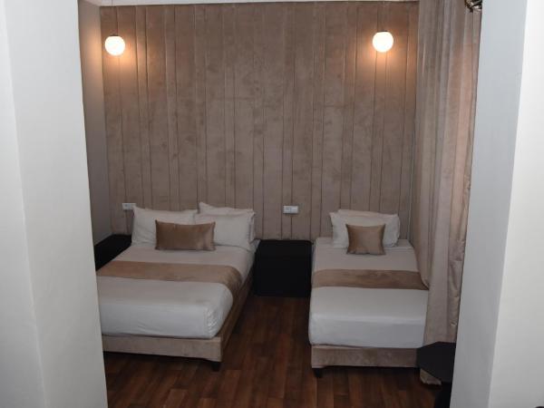 Cadé Hotel : photo 2 de la chambre chambre triple