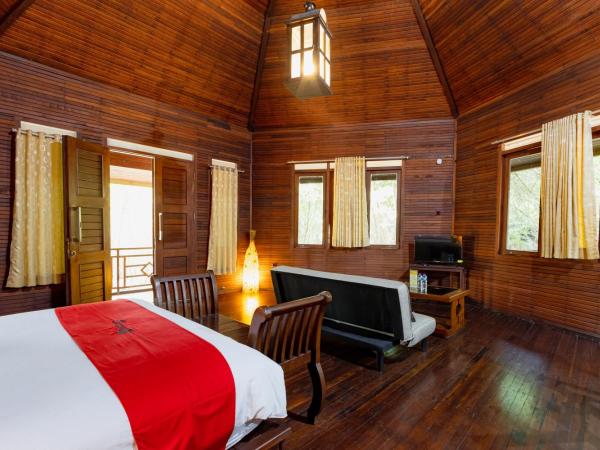 RedDoorz Resort @ Taman Wisata Mangrove : photo 2 de la chambre suite deluxe