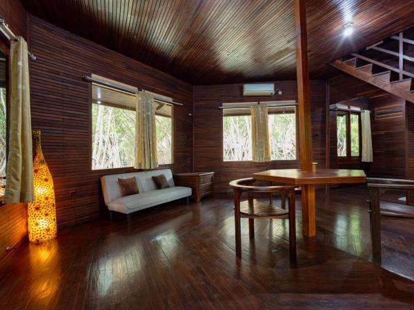 RedDoorz Resort @ Taman Wisata Mangrove : photo 7 de la chambre suite deluxe