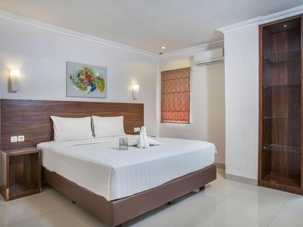 1O1 URBAN Jakarta Thamrin : photo 2 de la chambre suite familiale