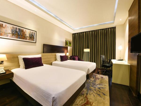 DoubleTree by Hilton Gurugram Baani Square : photo 3 de la chambre chambre lits jumeaux deluxe