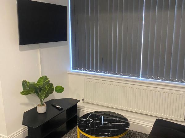 Black Ocean Holiday Apartments : photo 8 de la chambre appartement