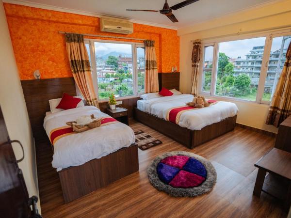 Hotel Himalayan Inn : photo 3 de la chambre chambre triple deluxe