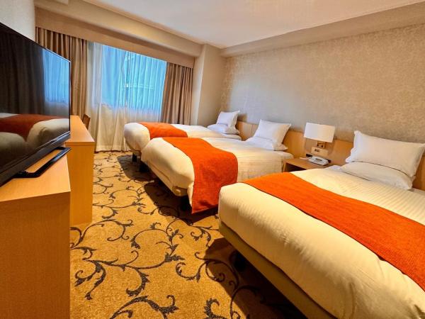 Hotel Rose Garden Shinjuku : photo 2 de la chambre chambre triple de luxe - non-fumeurs