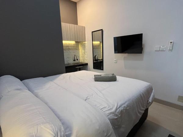 Kaira Room Guest House Syariah Mitra RedDoorz : photo 8 de la chambre chambre double standard