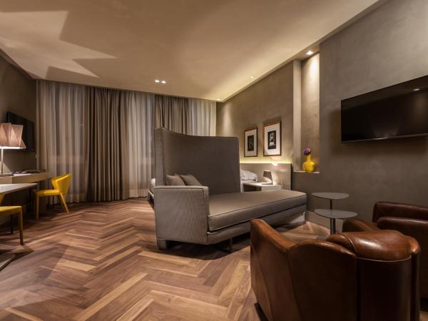 Liassidi Wellness Suites : photo 2 de la chambre suite lit queen-size avec bain turc - vue sur jardin