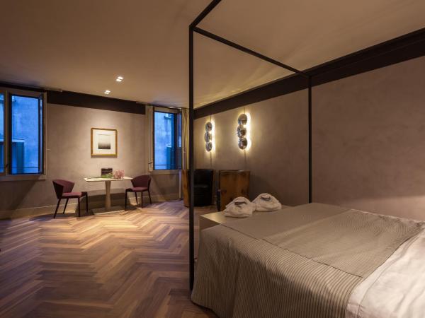 Liassidi Wellness Suites : photo 4 de la chambre suite lit queen-size avec bain turc - vue sur ville