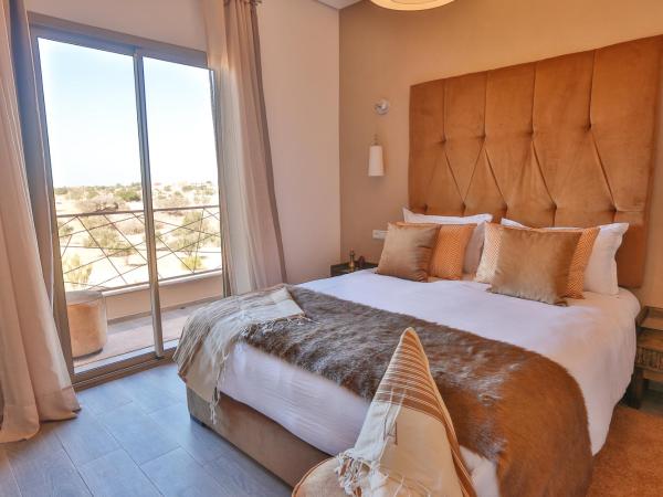 Villa ARGANINA piscine chauffée : photo 4 de la chambre suite lit queen-size deluxe