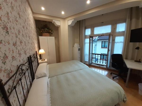 Uría 25 rooms : photo 9 de la chambre chambre lits jumeaux avec salle de bains privative