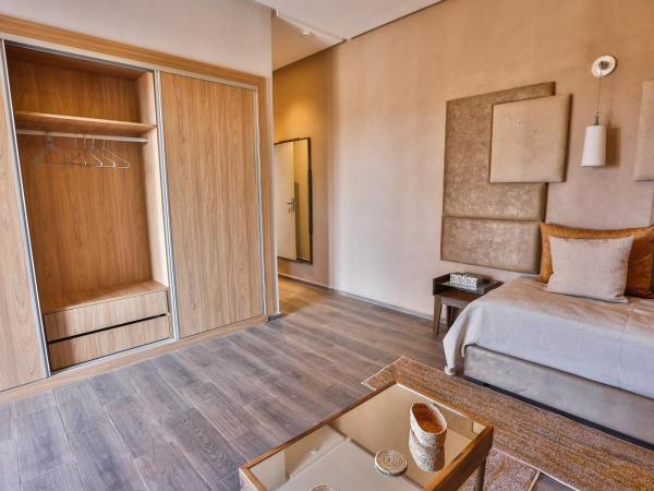 Villa ARGANINA piscine chauffée : photo 7 de la chambre suite lit queen-size deluxe