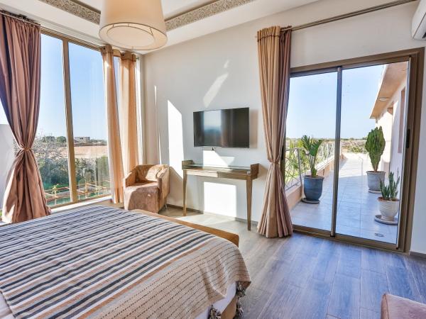 Villa ARGANINA piscine chauffée : photo 6 de la chambre suite lit queen-size deluxe