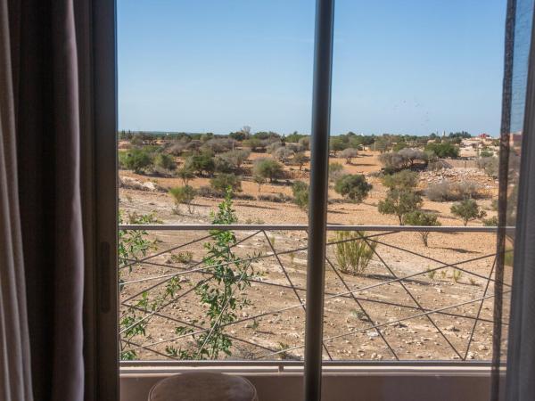 Villa ARGANINA piscine chauffée : photo 6 de la chambre suite junior – vue sur montagne