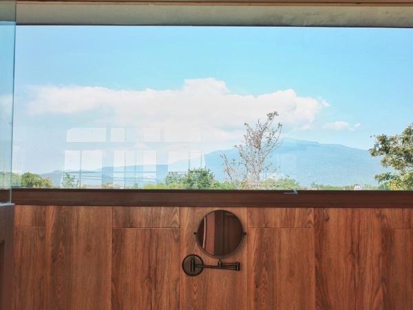 REYN.NE' DUPLEX SUITE : photo 2 de la chambre appartement avec vue sur la montagne