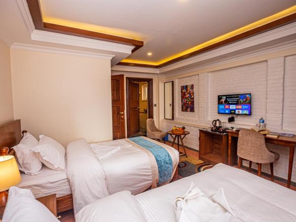 Darbar Heritage Inn : photo 4 de la chambre chambre lits jumeaux deluxe