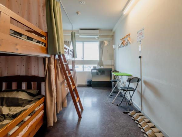 Fukuoka Share Hotel : photo 1 de la chambre lit dans dortoir pour femmes de 4 lits