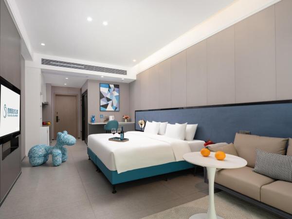 Yutai Hotel Apartment : photo 2 de la chambre chambre lit king-size deluxe