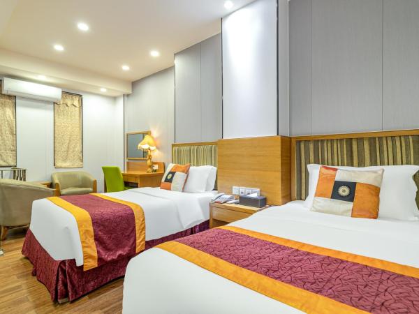 Guangzhou The Royal Garden Hotel : photo 1 de la chambre duplex suite twin beds