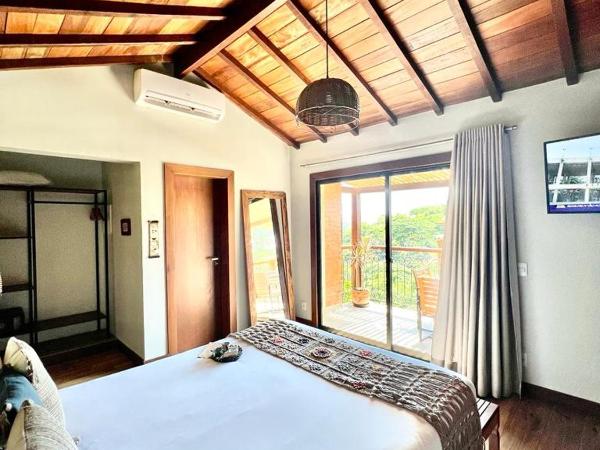 Pousada Villa Canaã : photo 6 de la chambre chambre triple avec balcon