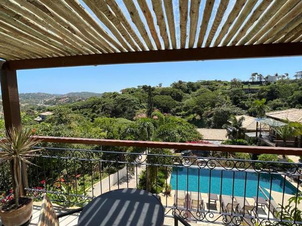 Pousada Villa Canaã : photo 2 de la chambre suite avec balcon