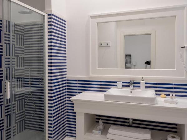 Duomo Guest House : photo 9 de la chambre chambre double ou lits jumeaux avec lit d'appoint