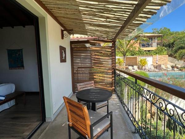 Pousada Villa Canaã : photo 2 de la chambre suite avec balcon