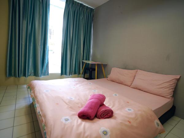 Swanling Kuching : photo 6 de la chambre chambre lit queen-size avec salle de bains commune