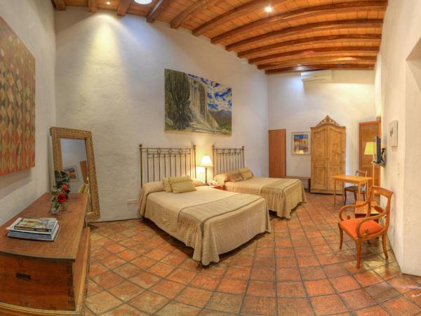 Hotel La Casona de Tita : photo 1 de la chambre chambre double avec 2 lits doubles