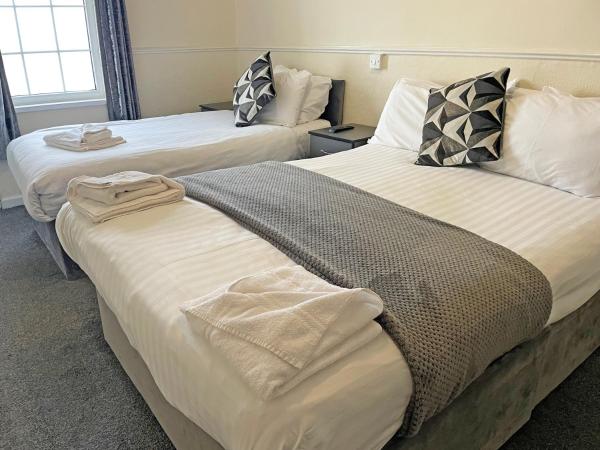 The President Hotel : photo 1 de la chambre chambre familiale (2 adultes + 1 enfant)