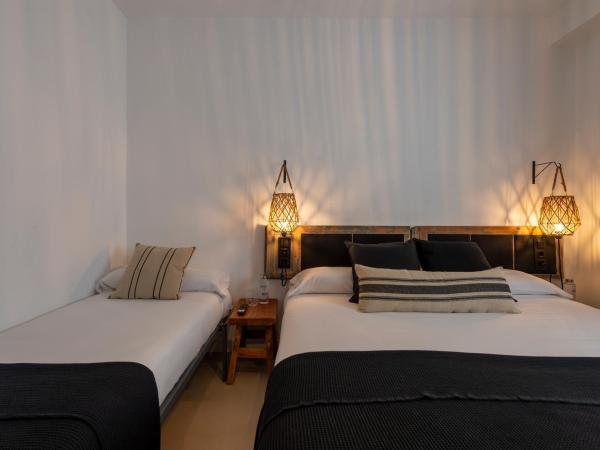 Hostal Boutique Es Menut : photo 5 de la chambre chambre triple