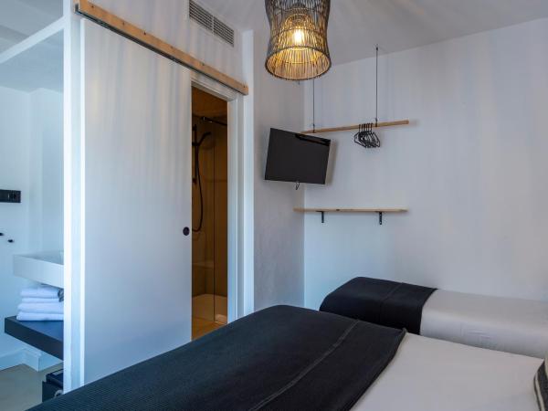 Hostal Boutique Es Menut : photo 7 de la chambre chambre triple