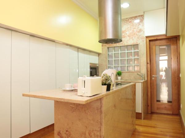 LX Factory guest house : photo 7 de la chambre petite chambre double