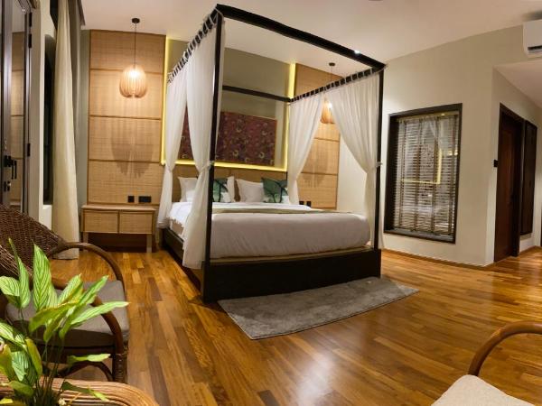 ke-lan-tan House : photo 1 de la chambre suite lit king-size avec balcon