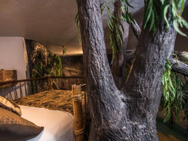 The Anniversary Inn - Fifth South : photo 4 de la chambre chambre lit king-size - vue sur piscine