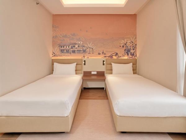 Cititel Express Ipoh : photo 4 de la chambre chambre lits jumeaux deluxe