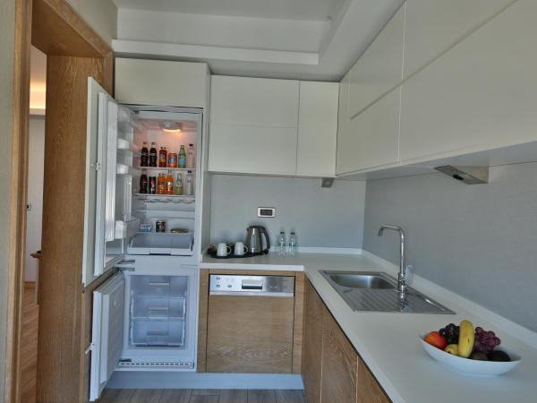 Bof Hotels Ceo Suites Atasehir : photo 6 de la chambre suite lit queen-size