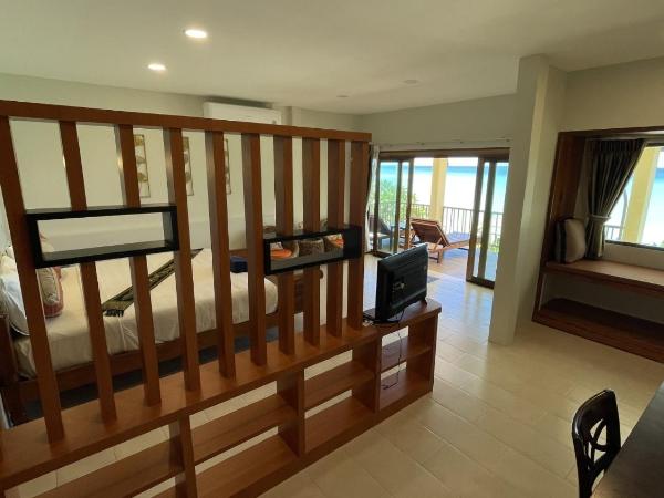 Paradise Pearl Bungalows : photo 2 de la chambre chambre lit queen-size - vue sur mer