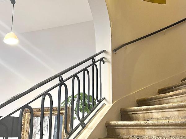 Suite Aubance - Maison Bossoreil : photo 1 de la chambre chambre quadruple avec baignoire