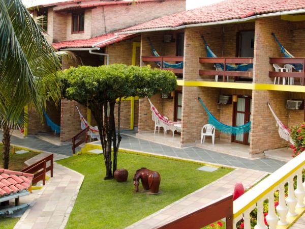 Hotel Tubarão : photo 5 de la chambre chambre triple