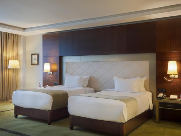 Grand Mogador City Center Casablanca : photo 1 de la chambre chambre lits jumeaux deluxe