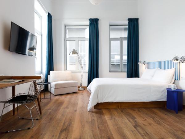 The Baroness : photo 1 de la chambre suite deluxe avec lit king-size