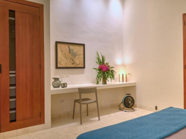 El Pueblo Mérida : photo 1 de la chambre suite deluxe avec lit king-size