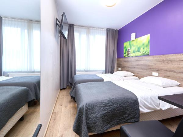 Hotel City Center : photo 2 de la chambre chambre lits jumeaux